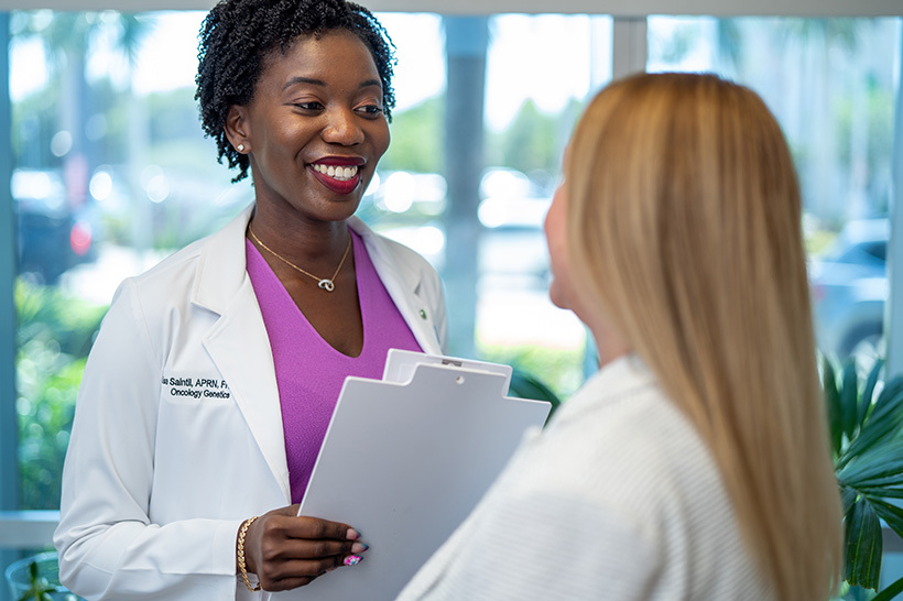 Lisa Saintil, genetic counselor, meets with Marie